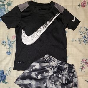Two toddlers Nike outfits
